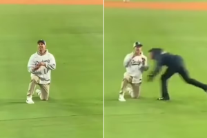 Security tackles baseball fan who proposed on-field