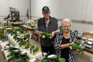 Alberta couple auctions off extensive collection of John Deere memorabilia