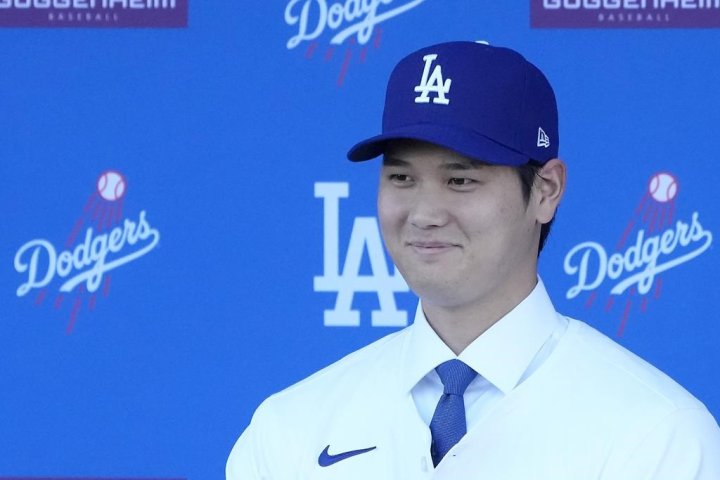 Shohei Ohtani avoids discussing Tommy John surgery in debut news conference with Dodgers