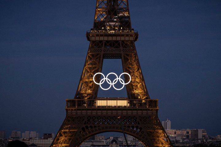 Olympic Rings Installed on Eiffel Tower to Commemorate 50 Days Until Paris Games – National and Global News